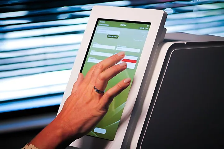 Operator entering an order on a device touchscreen connected to a laboratory information system